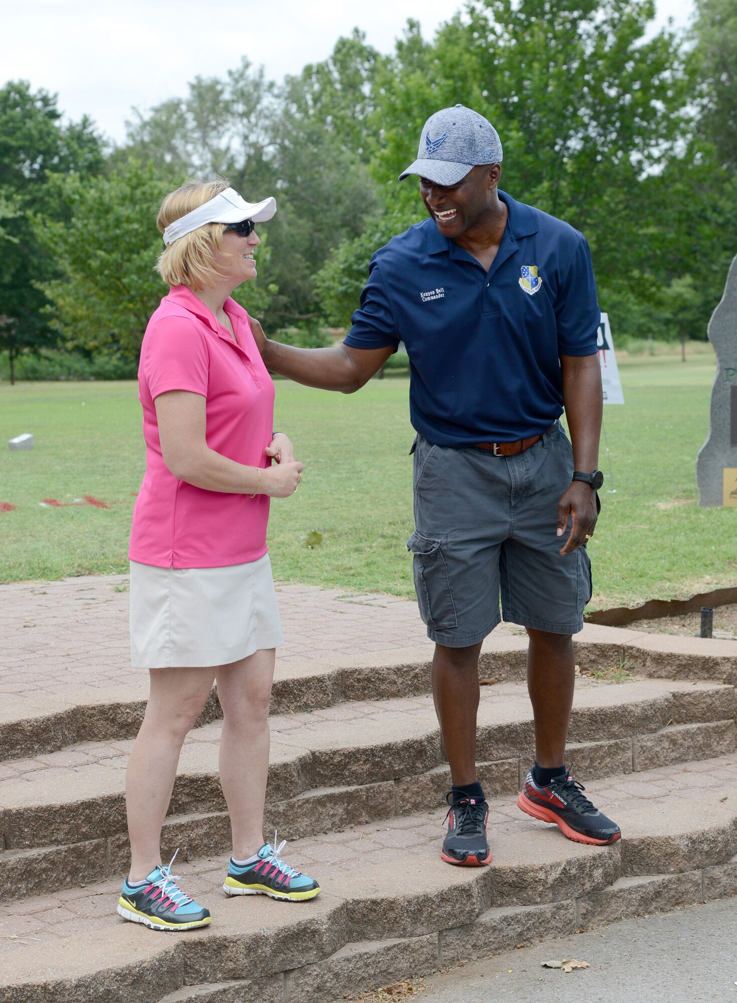 72nd Air Base Wing Command Chief Master Sgt. Melissa Erb surprises 72nd Air Base Wing Commander Col. Kenyon Bell at the 75th Anniversary Golf Tournament by having attendees sing "Happy Birthday" to him.