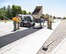 366th Civil Engineer Squadron Dirtboys lay asphalt at Mountain Home Air Force Base, Idaho, June 14, 2017. The Dirtboys perform a variety of tasks, from laying asphalt to removing snow; they're responsible for the foundation of the base.(U.S. Air Force photo by Senior Airman Jessica H. Smith/Released)