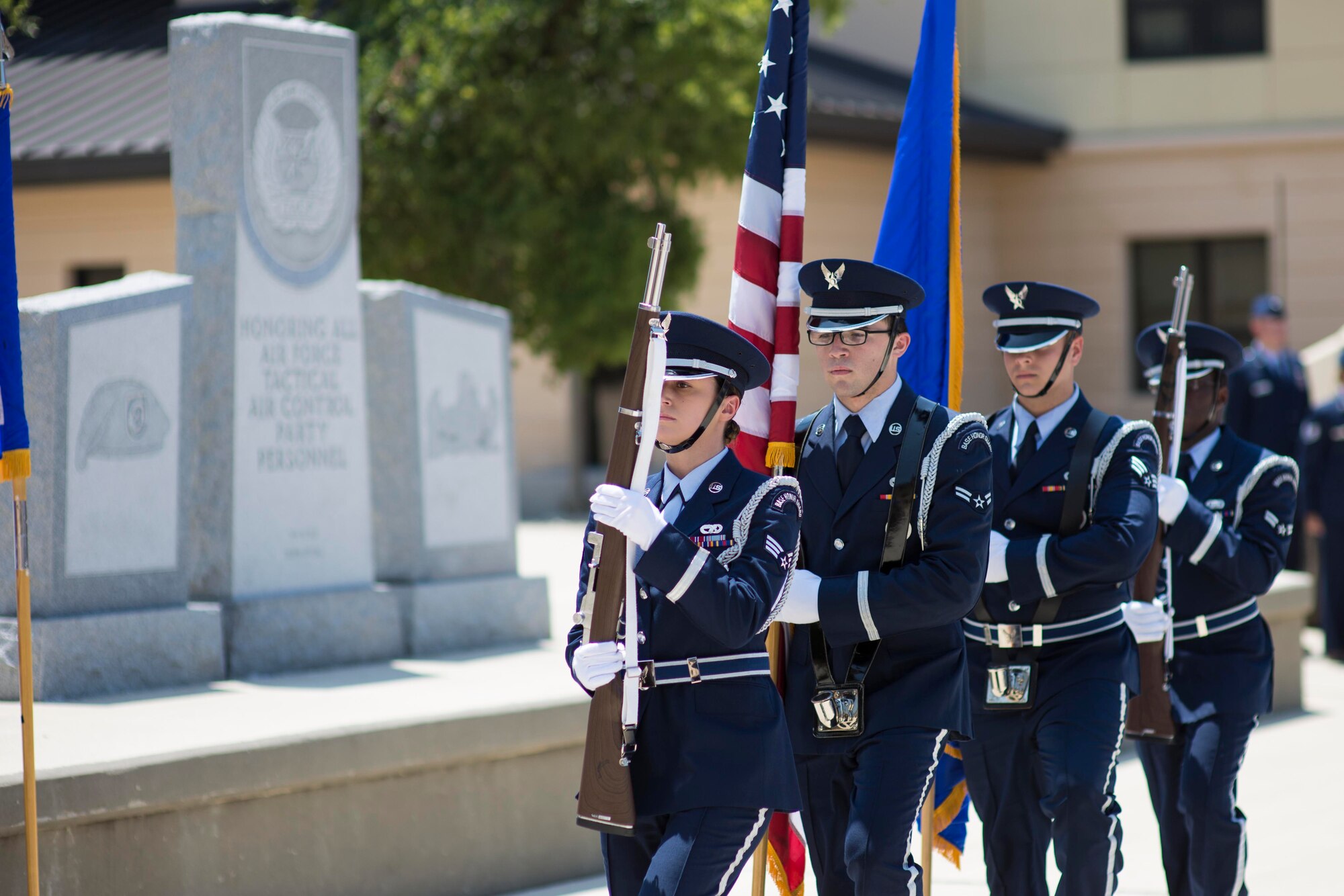 Members of the Joint Base San Antonio Honor Guard present the colors during the Tactical Air Control Party Memorial Rededication Ceremony outside the 353rd Battlefield Airmen Training Squadron at the JBSA-Lackland Medina Annex June 23, 2017. The TACP mission is to defeat the enemy through the use of airpower while protecting ground forces and non-combatants from the effects of friendly air to ground attacks. 