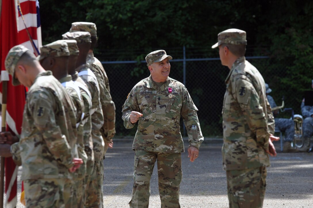 U.S. Army Reserve Command Sgt. Maj. Richard E. Castelveter, the outgoing senior enlisted adviser of the 412th Theater Engineer Command, makes a few final comments to the Command Headquarters and Headquarters Company Soldiers during a Change of Responsibility and retirement ceremony at the George Morris Army Reserve Center in Vicksburg, Miss., June 10, 2017. Command Sgt. Maj. Dennis E. Law relieved Castelveter who retired after serving more than 35 years of honorable service. (U.S. Army Reserve Photo by Sgt. 1st Class Clinton Wood)
