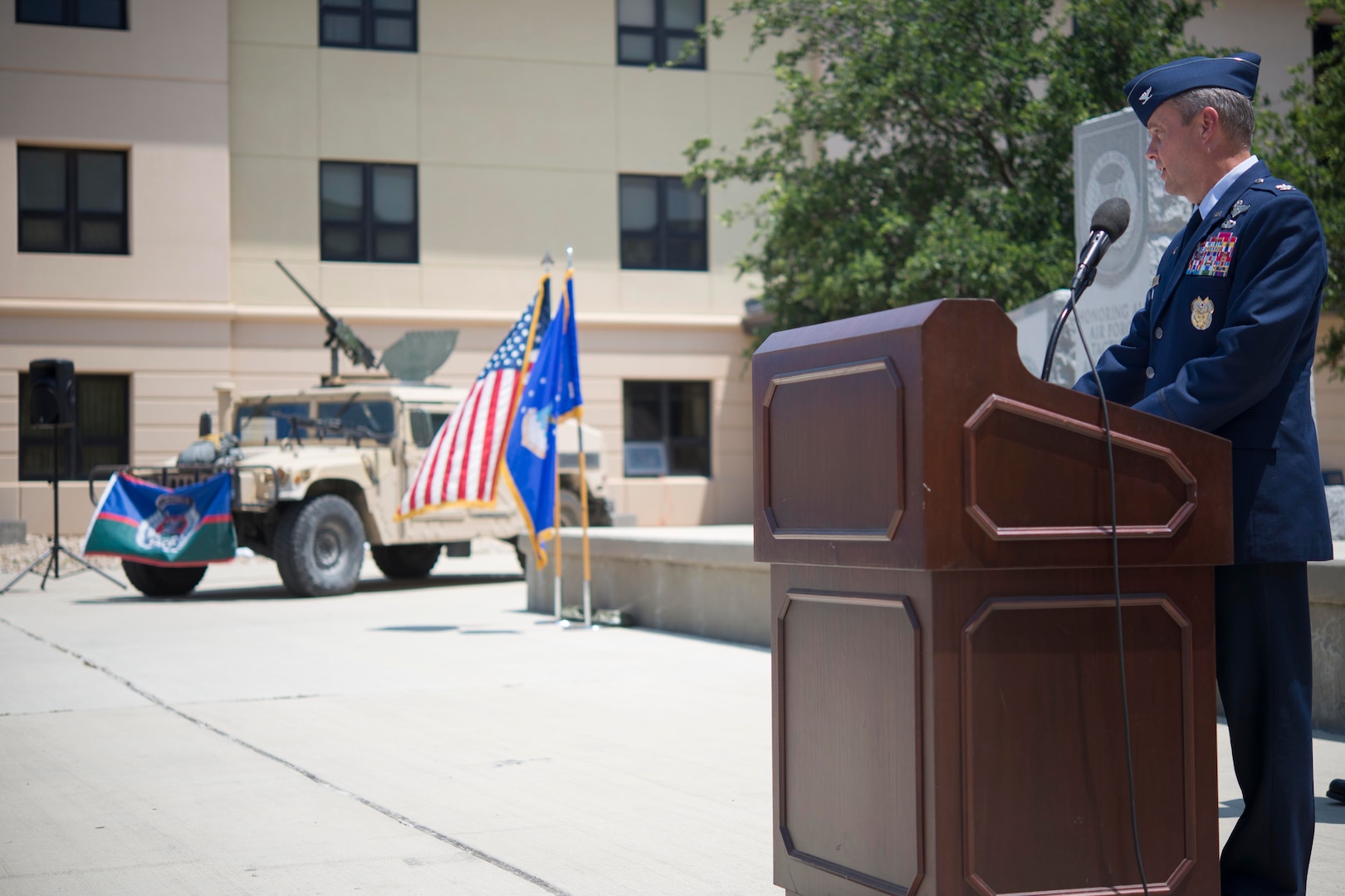 Retired Air Force Col. Peter Donnely delivers a speech during the Tactical Air Control Party Memorial Rededication Ceremony outside the 353rd Battlefield Airmen Training Squadron at the Joint Base San Antonio-Lackland Medina Annex June 23, 2017. Donnely accumulated nearly nine years in leadership positions within the 18th Air Support Operations Group and led TACP members supporting operations Enduring and Iraqi Freedom as Expeditionary Air Support Operations Group commander. 
