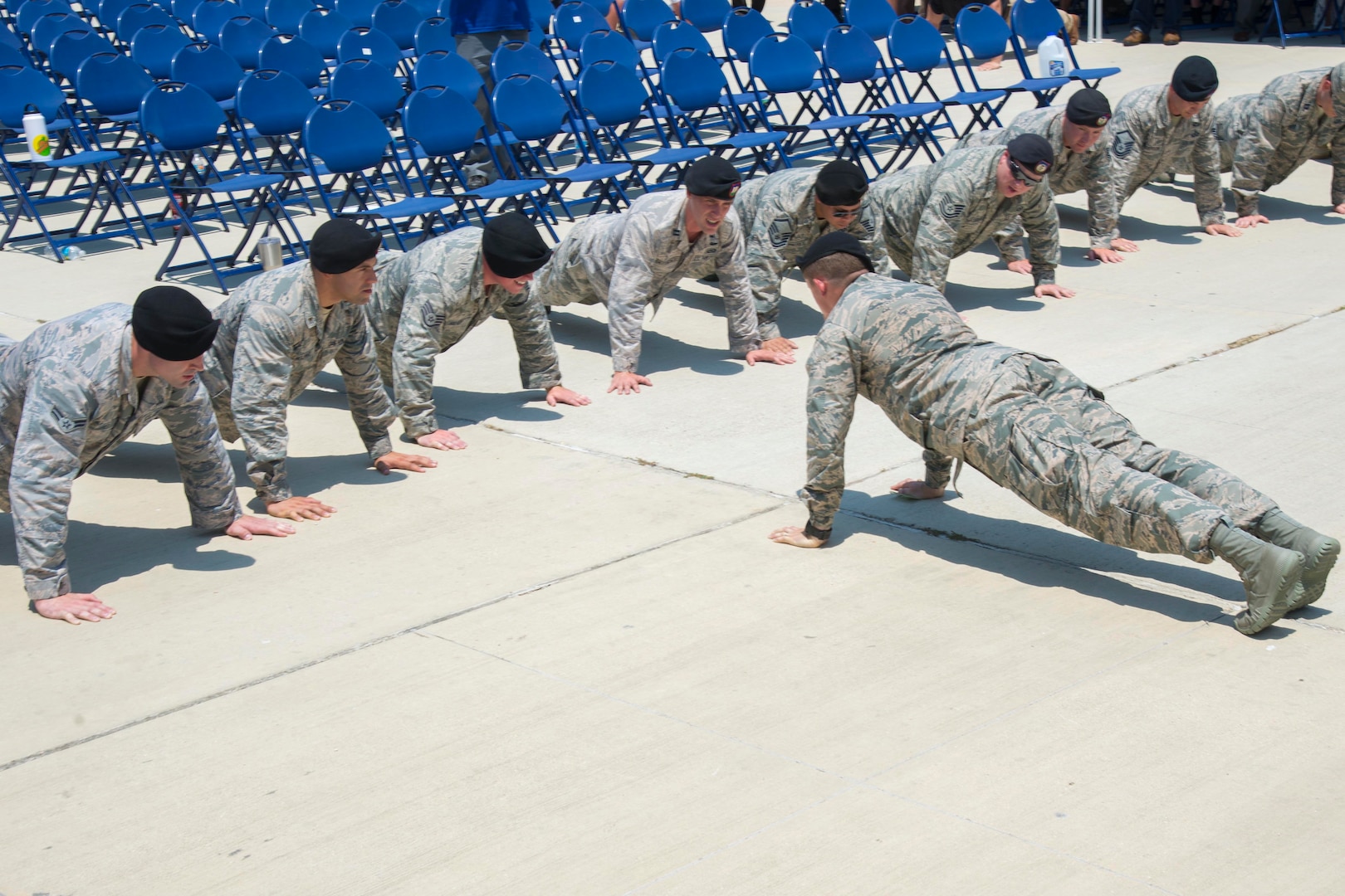 Tactical Air Control Party Airmen perform memorial pushups in honor of fallen Airmen in front of the TAC-P memorial outside the 353rd Battlefield Airmen Training Squadron at the Joint Base San Antonio-Lackland Medina Annex during a memorial ceremony June 23, 2017. The ceremony was held to rededicate the memorial to recognize the innumerable sacrifices made daily by TACP personnel past and present. 