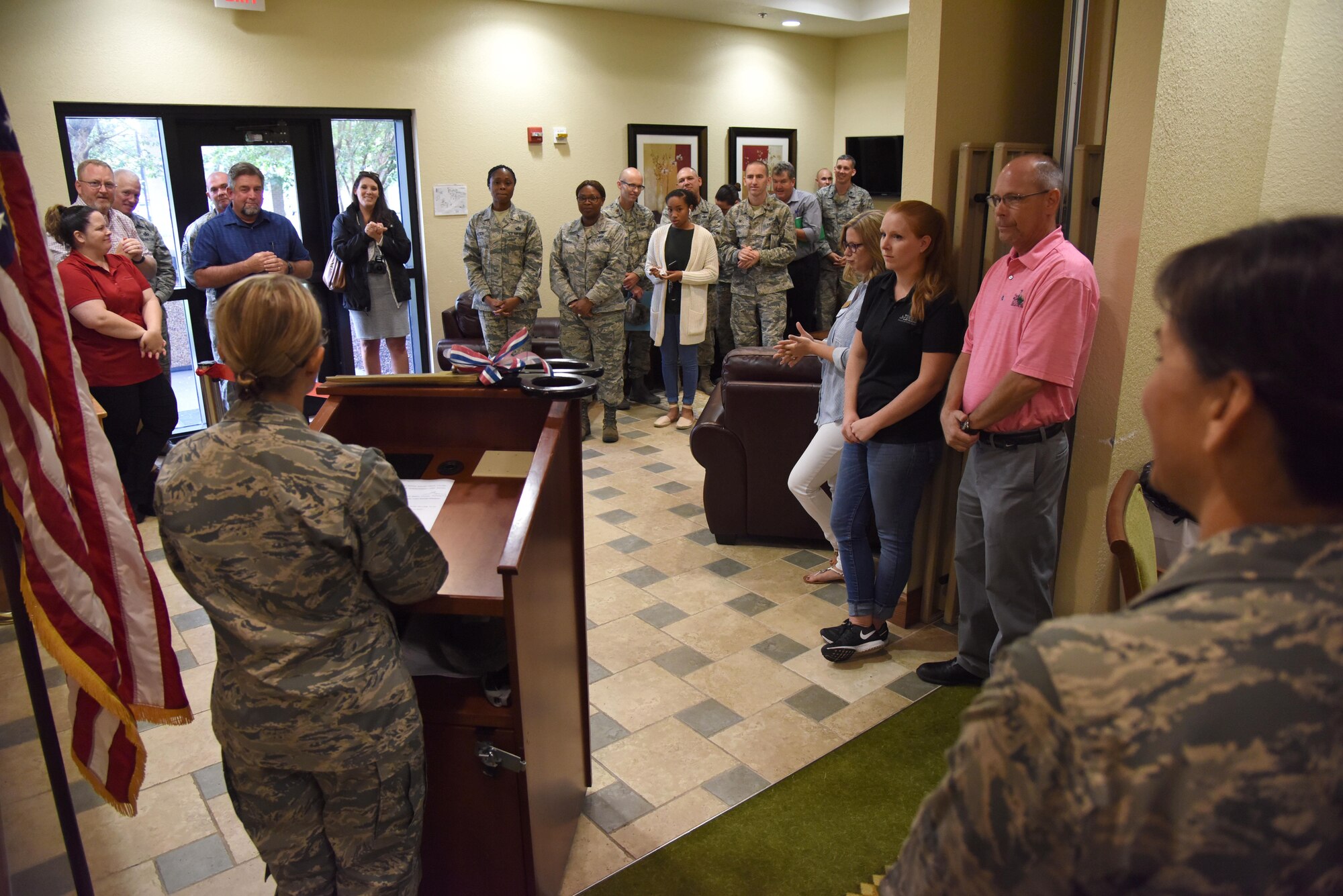 Lt. Col. Teresa King, 81st Force Support Squadron commander, delivers welcoming remarks during the “It Is In The Cup” ribbon cutting ceremony in the Bay Breeze Event Center June 29, 2017, on Keesler Air Force Base, Miss. Keesler's new coffee & smoothie bar serves Starbucks coffee, Frappuccino’s, iced beverages and espresso as well as Island Oasis smoothies in a variety of flavors. A full menu of items can be found at www.keesler81fss.us. (U.S. Air Force photo by Kemberly Groue)

