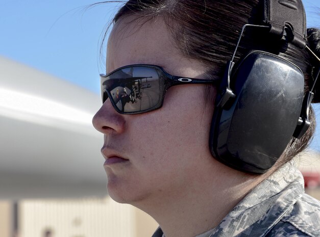 An Airman from the 57th Maintenance Group observes a load competition June 30, 2017, at Nellis Air Force Base, Nev. Competition examiners focused on the team’s ability to accurately and quickly load and unload munitions onto their assigned aircraft. (U.S. Air Force photo by Airman 1st Class Andrew D. Sarver/ Released)