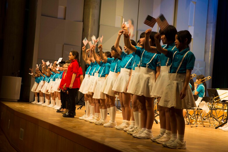 American and Japanese students from Matthew C. Perry Elementary School and Marifu Elementary School take center stage during a performance at the 7th annual U.S.-Japan Friendship Concert at the Sinfonia Iwakuni Concert Hall in Iwakuni City in Japan, Feb. 24, 2017. The concert is a way for the student performers to experience different cultures and communicate with each other through music despite the language barrier. (U.S. Marine Corps photo by Lance Cpl. Gabriela Garcia-Herrera)