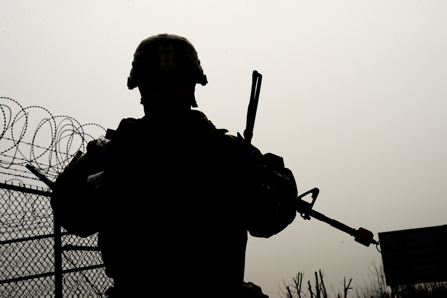 U.S. Air Force Staff Sgt. William Summerfield, 51st Security Forces Squadron base defense operations center controller, conducts an “outside the wire” perimeter check during Exercise Beverly Herd 17-1 at Osan Air Base, Republic of Korea, March 1, 2017. The 51st SFS’s mission is to maintain a secure environment and to increase combat power during exercise and real life scenarios. (U.S. Air Force photo by Airman 1st Class Gwendalyn Smith)