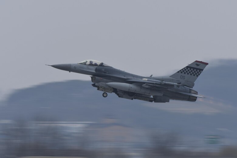 An F-16 Fighting Falcon assigned to the 36th Fighter Squadron takes off for a training mission during Exercise Beverly Herd 17-1 at Osan Air Base, Republic of Korea, March 1, 2017. The exercise provided the fighter Squadrons at Osan the chance to practice a large amount of dynamic firepower training in a short period of time. (U.S. Air Force photo by Staff Sgt. Victor J. Caputo)