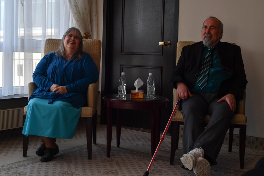 Colynn and John Hamilton, U.S. Air Forces in Europe human resources specialist and management analyst respectively, sit during their dual retirement ceremony on Ramstein Air Base, Germany, Feb. 24, 2017. With at least 40 years of service each, John and Colynn retired to spend time with their five kids and 12 grandchildren. (U.S Air Force photo by Senior Airman Tryphena Mayhugh)