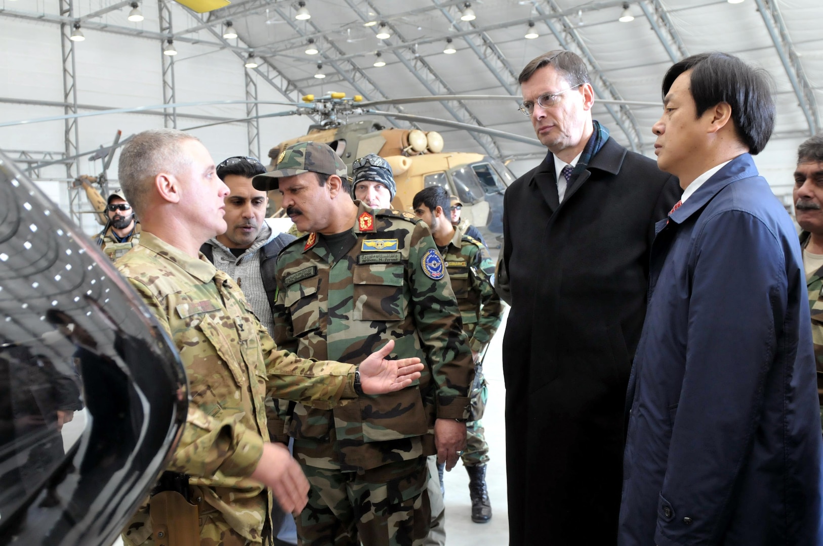 Walter Haßmann, German Ambassador to Afghanistan; Chin Ki-Hoon, Republic of Korea Ambassador to Afghanistan; Maj. Gen. Richard Kaiser, Combined Security Transition Command – Afghanistan commander and Security Assistance, Headquarters, Resolute Support deputy chief of staff, and CSTC-A Command Sgt. Maj. Daniel Hendrex, visited Train, Advise, Assist Command – Air, Kabul, Afghanistan, Feb. 22, 2017. Col. Nick Gismondi, TAAC-Air deputy commander and 438th Air Expeditionary Wing vice commander, along with Afghan Brig. Gen. Mohammad Shoaib Stanikzai, Afghan Air Force commander, and multiple TAAC-Air subject matter experts, gave the ambassadors a mission briefing and tour of AAF aircraft. (U.S. Navy photo by Lt. j.g. Egdanis Torres Sierra, Combined Security Transition Command CSTC–A Public Affairs)