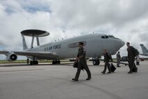 Aircrew from the 961st Airborne Air Control Squadron prepare to board an E-3 Sentry during annual exercise Cope North Feb. 23, 2017, at Andersen Air Force Base, Guam. The 961st AACS is a combat-ready E-3 Sentry squadron providing airborne command and control, long-range surveillance, detection, and identification information for commanders in support of U.S. goals. (U.S. Air Force photo by Senior Airman John Linzmeier)