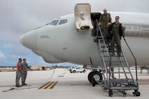 Canadian and U.S. Airmen from the 961st and 962nd  Airborne Air Control Squadrons exit an E-3 Sentry from the 961st Airborne Air Control during annual exercise Cope North Feb. 23, 2017, at Andersen Air Force Base, Guam. Members of the Canadian Air Force are operating within the 962nd AACS from Elmendorf Air Force Base, Alaska, as part of an exchange program. Cope North is being held to provide opportunities for 22 flying units from U.S. Pacific Command, the Royal Australian Air Force and the Japan Air Self-Defense Force to train together, increase interoperability and improve their effectiveness at stabilizing the Indo-Asia-Pacific region. (U.S. Air Force photo by Senior Airman John Linzmeier)