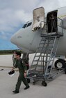 A Japan Air Self-Defense Force airman exits a U.S. Air Force E-3 Sentry from the 961st Airborne Air Control Squadron during annual exercise Cope North Feb. 23, 2017, at Andersen Air Force Base, Guam. Exercise Cope North serves as a keystone event to promote stability and security throughout the Indo-Asia-Pacific region by enabling regional forces to hone vital readiness skills. (U.S. Air Force photo by Senior Airman John Linzmeier)