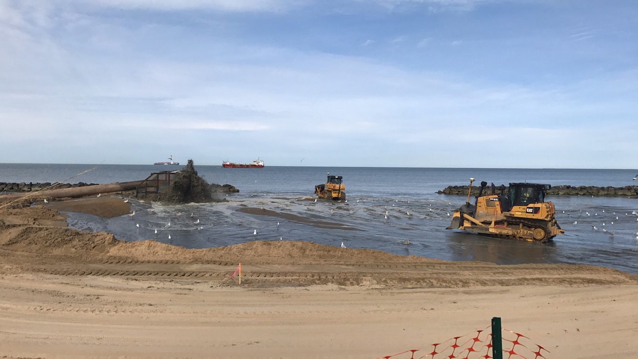 NORFOLK, Va. -- Norfolk District, U.S. Army Corps of Engineers’ contractors from Great Lakes Dredging and Dock Company pump sand dredged from the bottom of the Chesapeake Bay up to Norfolk, Virginia’s Ocean View Beach. The sand is part of a $34.5 million project to reduce storm damage risk to infrastructure along a 7.3 mile stretch of waterfront, which is susceptible to damage during costal storms. Once complete, the beach will be 60 feet wide and slope up to 5 feet above mean low water. (U.S. Army photo/Patrick Bloodgood)