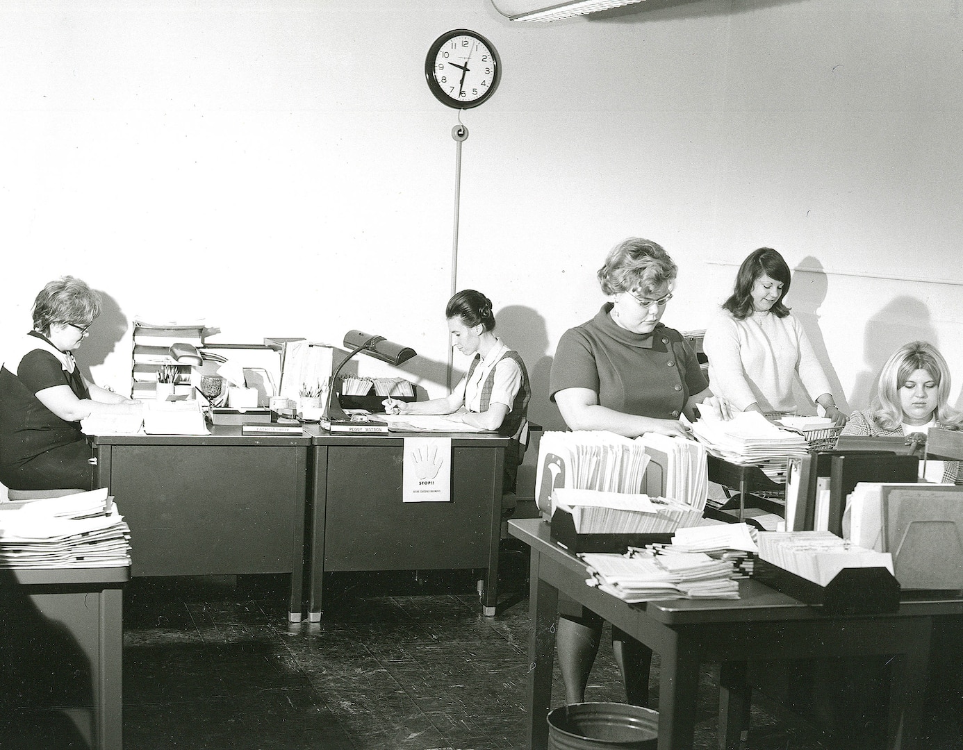 Defense Supply Agency Director Army Lt. Gen. Andrew McNamara visits the DSA offices in Battle Creek, Michigan, for the dedication of the Defense Logistics Services Center in February 1963.