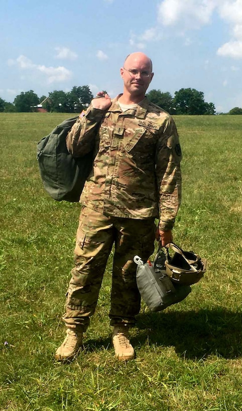 Chief Warrant Officer 4 Joseph Giles makes his last parachute jump on July 6, 2016 at Pappy Tidwell Drop Zone, Mechanicsburg, Pennsylvania. After serving as a warrant officer for over 14 years, the last three with DLA, Giles is retiring from active duty in February 2017 and will continue providing warfighter support in his new DLA position as a supervisory general supply specialist at DLA Distribution Susquehanna.