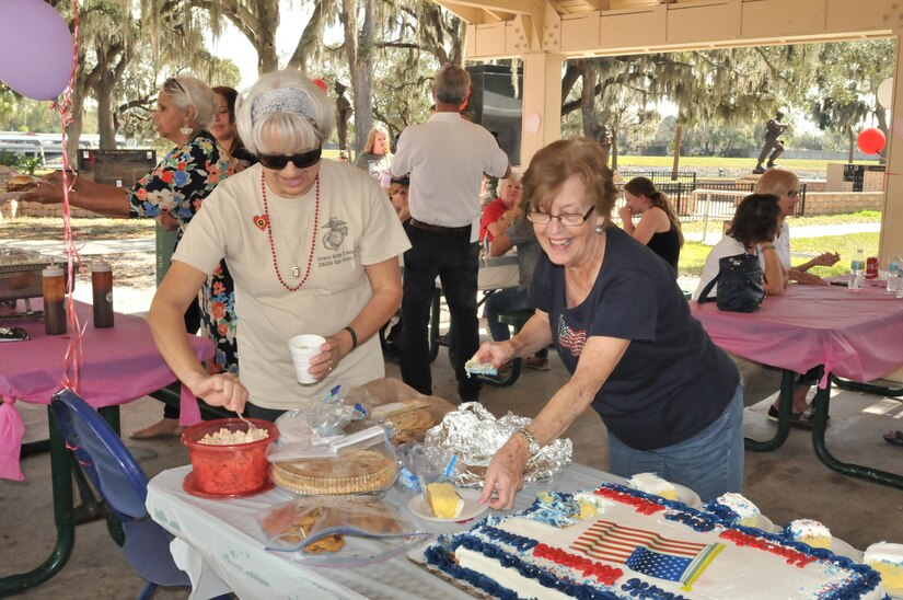 Michele Carey and Linda Keneen prepare the desserts for Operation Love Letters attendees. These were favorite desserts of fallen service members remembered during the event by families in attendance. Sweet memories were created as families shared why the Service member chose this as their favorite dessert or some other detail that made an important memory to associate with the dessert. This activity is part of Operation Love Letters, which  is an annual patriotic celebration to honor fallen service members through fellowship with family and friends gathered together writing love letters, scripting poetry, sharing loveable memories of their service member, and enjoying the offerings of some very special guests. This year, the event was held at Veterans Memorial Park in Tampa on Feb. 19, 2017.
