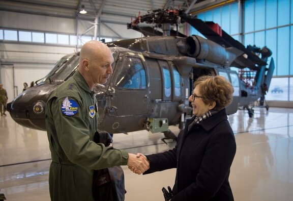 Maj. Gen. Timothy Zadalis thanks Nancy Bikoff Pettit, U.S. Ambassador to Latvia, for welcoming the U.S. military to Latvia during an event at Riga International Airport, Latvia, March 1, 2017. A U.S. Air Force C-5M Super Galaxy delivered UH-60 Black Hawks for the U.S. Army in Latvia. Five Black Hawk helicopters will be deployed to Latvia as part of a larger contingent of helicopters and personnel deployed to support Operation Atlantic Resolve, a U.S. commitment to maintaining peace and stability in the European region. (U.S. Air Force photo/Tech. Sgt. Ryan Crane)
