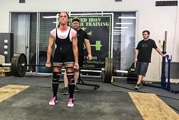 Army Sgt. 1st Class Jennifer Palacios performs a squat during in the American Powerlifting Association Thunder Bay Throwdown in Largo, Fla., Jan. 21, 2017. Palacios broke the Florida state squat record in the Raw Sub Master (33-39) age division by lifting 230 pounds. Courtesy photo