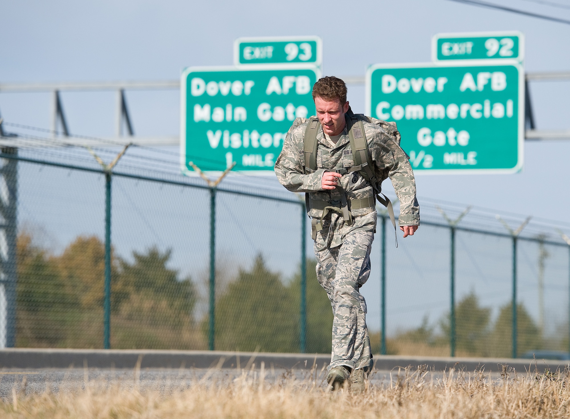 Staff Sgt. Jon Porubsky, 707th Intelligence, Surveillance and Reconnaissance Group security specialist, Fort Meade, Md., runs back to the start-finish line located at the Air Mobility Command Museum just over a mile away during the 18th Annual Security Forces Ruck March, Feb. 25, 2017, on Dover Air Force Base, Del. Carrying a 30-pound ruck on his back, Porubsky placed first in the individual category by completing the 6.6-mile course in 54 minutes, 23 seconds. The ruck march is an annual event commemorating the Korean War Battle of the Chosin Reservoir, November-December 1950. (U.S. Air Force photo by Roland Balik)