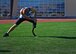 U.S. Air Force Tech. Sgt. Ben Seekell, 2017 AF Trials competitor, stretches before his 1,500 meter run during Track and Field qualifications at the Warrior Fitness Center Feb. 28, 2017 at Nellis Air Force Base, Nev. Seekell impressively returned to active duty after a 2011 improvised explosive device attack in Afghanistan. (U.S. Air Force photo by Senior Airman Chip Pons)