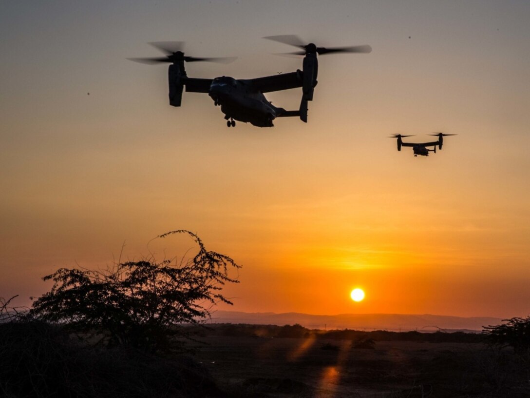 MV-22 Ospreys approach a landing zone during a training exercise conducted in Djibouti, Jan. 10, 2017. Ospreys have the ability to transport Marines and sailors quickly to the battlefield due to their ability to tilt their rotors horizontally and fly like an airplane. The Ospreys and crew are with Marine Medium Tiltrotor Squadron 163 (Reinforced), 11th Marine Expeditionary Unit. Marine Corps photo by Lance Cpl. Brandon Maldonado
