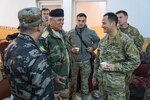 U.S. Army Lt. Col. Jim Browning (right) speaks to a 9th Iraqi Army Division brigade commander before a review of the division’s concept of operations for the upcoming battle to liberate West Mosul, Feb. 17, 2017.  Browning is the battalion commander of 2nd Battalion, 508th Parachute Infantry Regiment, 2nd Brigade Combat Team, 82nd Airborne Division and the Coalition advisor for the 9th IAD.   2nd BCT, 82nd Abn. Div. is deployed in support of Operation Inherent Resolve, to enable their Iraqi security forces partners through the advise and assist mission, contributing planning, intelligence collection and analysis, force protection, and precision fires to achieve the military defeat of ISIS.  Combined Joint Task Force-Operation Inherent Resolve is the global Coalition to defeat ISIS in Iraq and Syria. (U.S. Department of Defense photo by U.S. Marine Corps Capt. Timothy Irish)