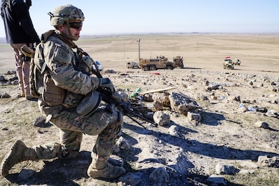 Specialist Matt Schultz, a member of the U.S. Army advise and assist team and members of the 9th Iraqi Army Division watch a tactical unmanned aerial system while commanding and controlling air strikes and tracking the progress of brigades clearing the village of Bakhaira, Iraq on the first day of the battle to liberate West Mosul, Feb. 19, 2017.  The advise and assist team is from 2nd Battalion, 508th Parachute Infantry Regiment, 2nd Brigade Combat Team, 82nd Airborne Division.  2nd BCT, 82nd Abn. Div. is deployed in support of Operation Inherent Resolve, to enable their Iraqi security force partners through the advise and assist mission, contributing planning, intelligence collection and analysis, force protection, and precision fires to achieve the military defeat of ISIS.  Combined Joint Task Force-Operation Inherent Resolve is the global Coalition to defeat ISIS. (U.S. Department of Defense photo by U.S. Marine Corps Capt. Timothy Irish)