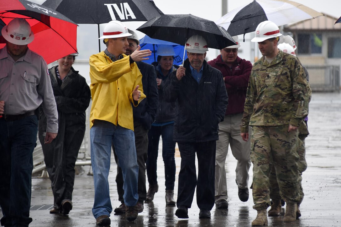 Adam Walker (Yellow Jacket), U.S. Army Corps of Engineers Nashville District project manager, briefs Douglas Lamont, senior official performing duties of secretary of the Army for Civil Works, on the challenges of maintaining and operating the deteriorating Chickamauga Lock Feb. 28, 2017 in Chattanooga, Tenn. The Tennessee Valley Authority owns the dam while the Nashville District operates and maintains the lock. 