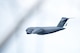 A C-17 Globemaster III from the 62nd Airlift Wing at Joint Base Lewis-McChord flies over Pope Army Airfield with a load of 82nd Airborne Division paratroopers after taking off during Battalion Mass Tactical Week, held here Feb. 27 through March 2. Airmen in the 43d Air Mobility Operations Group here provided support for visiting Air Mobility Command aircrews from Joint Base Lewis-McChord and other AMC units, and for Fort Bragg Soldiers during the joint training exercise. (U.S. Air Force photo/Marc Barnes)