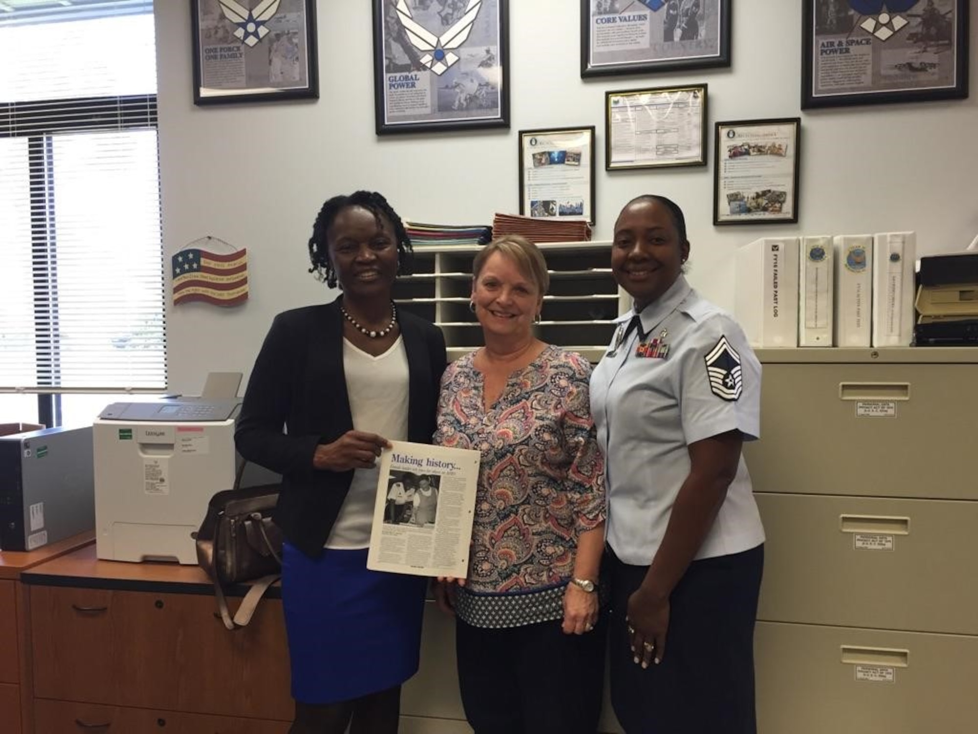 Retired Senior Master Sgt. Terry Cooper, left, poses for a photo with Dorothea Clisby 336th Recruiting Squadron secretary, middle and Senior Master Sgt. Josephine Davis-Fogle, 336th RCS production superintendent, during a visit, March 24, 2016, at Moody Air Force Base, Ga. Cooper was the first female squadron superintendent of the 336th RCS. Twenty years later, Davis-Fogle is the only other female to hold that position and works with the same secretary as her predecessor. (Courtesy Photo)