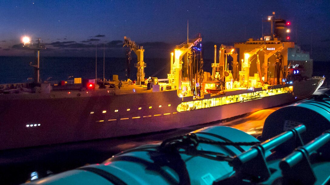 The replenishment oiler USNS Pecos steams alongside amphibious assault ship USS Bonhomme Richard during a fueling in the East China Sea, Feb. 28,2017. The Richard is in the Indo-Asia-Pacific region, serving as a forward-capability for any type of contingency. Navy photo by Petty Officer 3rd Class William Sykes