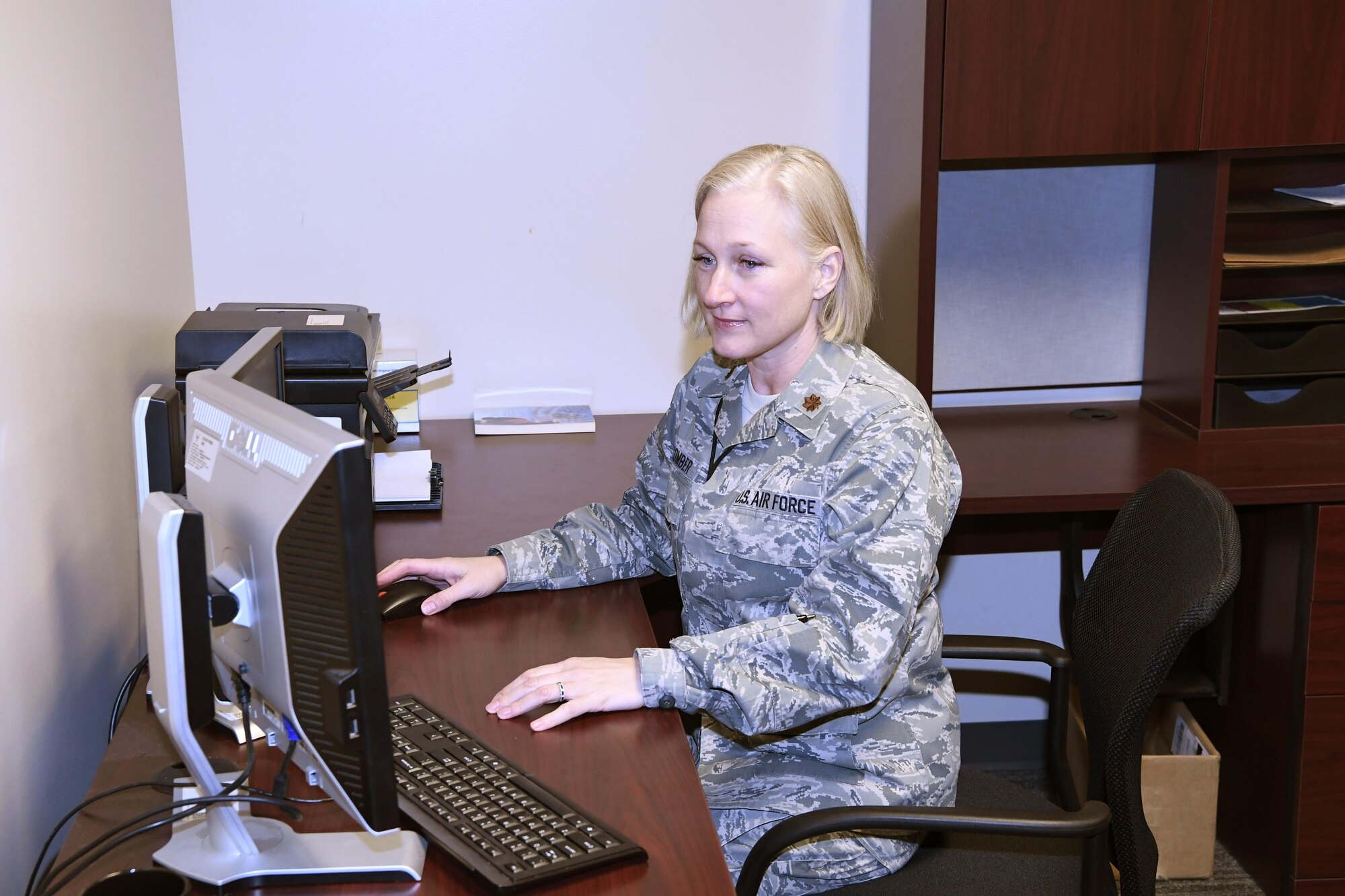 Maj. Macomber, 217th Air Operations Group, poses for her Guardsman of the Month Photo