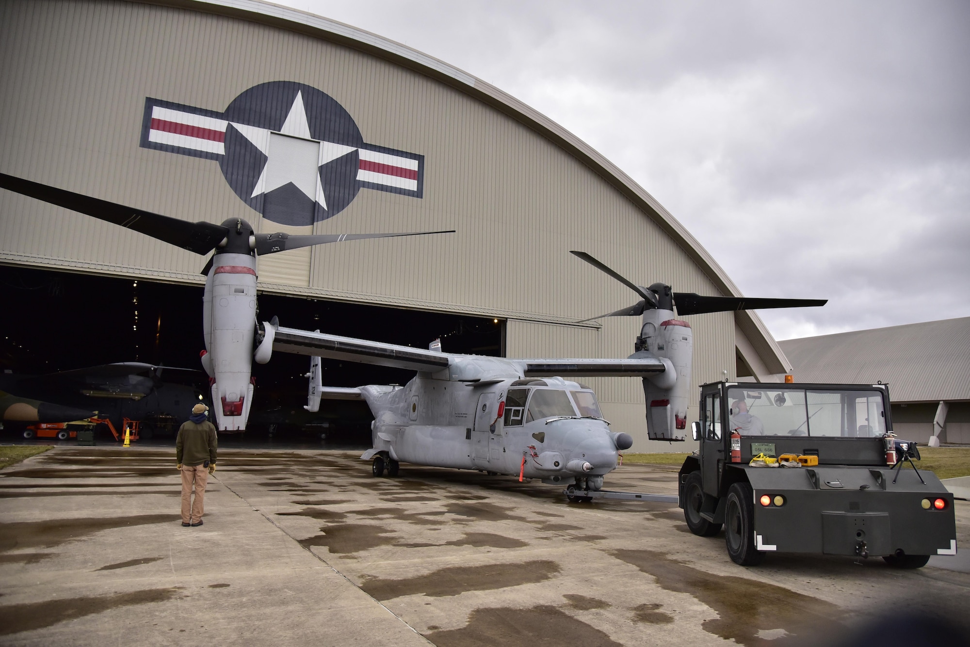 DAYTON, Ohio -- Bell-Boeing CV-22B Osprey being moved into position in the Cold War Gallery at the National Museum of the United States Air Force. The restoration crew members worked as part of a team to complete the gallery reconfiguration on Jan. 26, 2017. (U.S. Air Force photo)