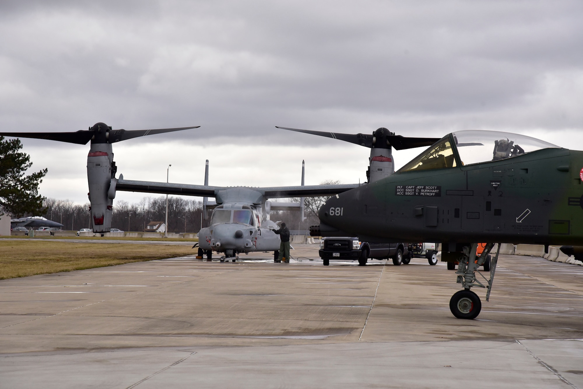 DAYTON, Ohio -- The Bell-Boeing CV-22B Osprey and the Fairchild Republic A-10A Thunderbolt II at the National Museum of the United States Air Force. The restoration crew members worked as part of a team to complete the gallery reconfiguration on Jan. 26, 2017. (U.S. Air Force photo)