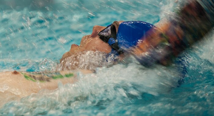 An Air Force Wounded Warrior Trials competitor performs a backstroke during the men’s 50 meter backstroke during the AFW2 at the University of Nevada Las Vegas pool, Feb. 26, 2017. This will be the sixth time Nellis Air Force Base, Nev.,  is hosting the camp and wounded warriors are hopeful to come back. (U.S. Air Force photo by Airman 1st Class Kevin Tanenbaum/Released)