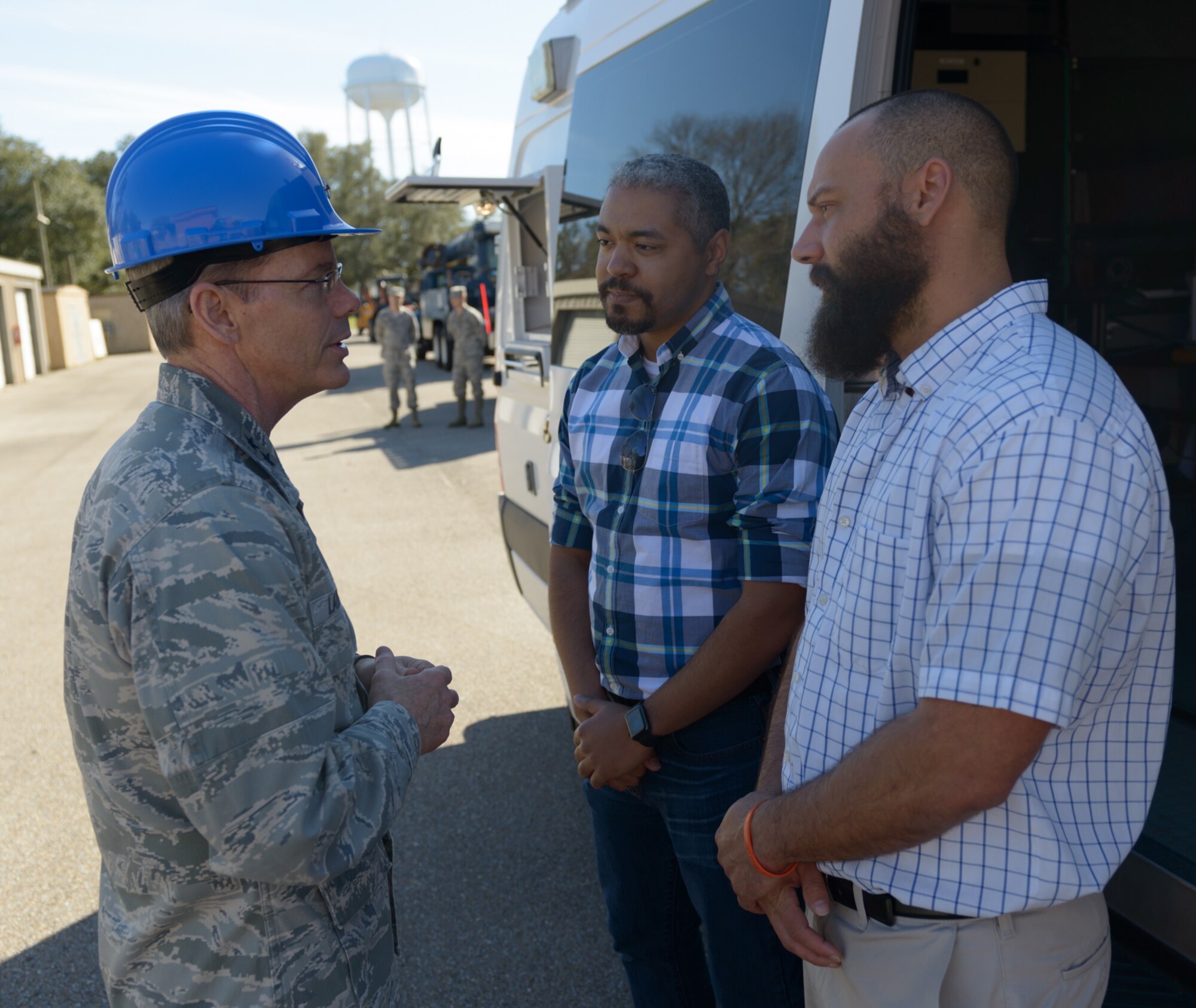 Maj. Gen. Robert LaBrutta, 2nd Air Force commander, discusses the 85th Engineering Installation Squadron mission with (front) Justin Johnston and _Alton Richards, 85th EIS electronic engineers during a 2nd AF immersion tour of the unit located at Keesler Air Force Base, Miss., Feb. 9, 2017. The Airmen at the 85th EIS are part of the only active duty EIS in the Air Force. They are also the only organization in the Defense Department providing specialized engineering services such as electromagnetic hazard and interference investigations and High Altitude Electromagnetic Pulse protection. (U.S. Air Force photo by Andre’ Askew)