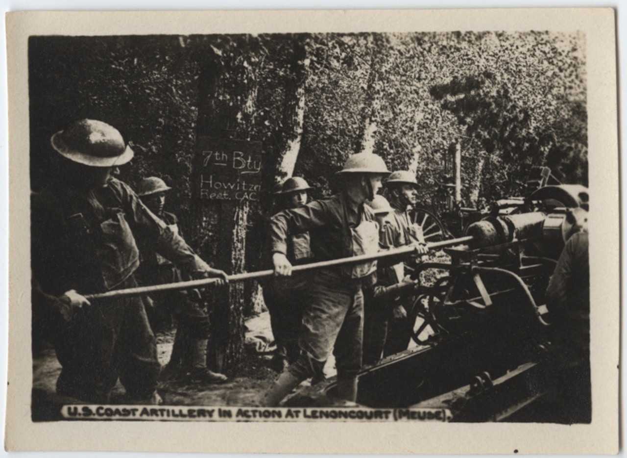 Sailors of the 7th Battery of the Howitzer Regiment of the U.S. Coastal Artillery clean their gun during operations in France during World War I. Photo courtesy of the National World War I Museum and Memorial