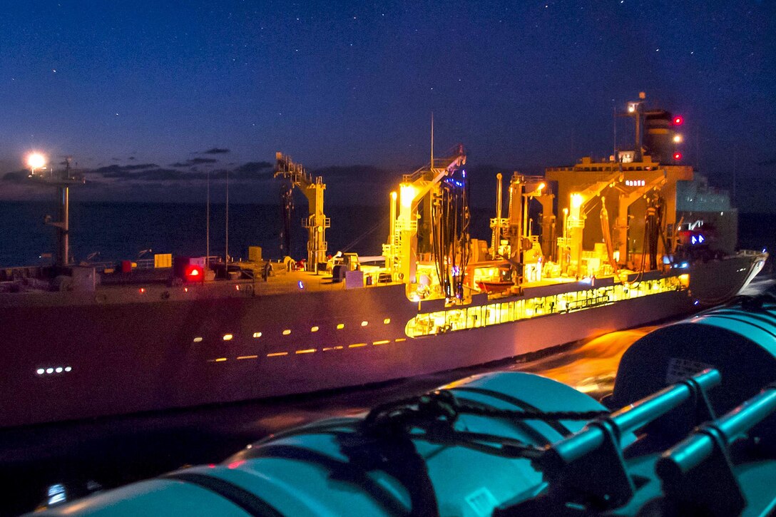 The replenishment oiler USNS Pecos steams alongside amphibious assault ship USS Bonhomme Richard during a fueling in the East China Sea, Feb. 28,2017. The Richard is in the Indo-Asia-Pacific region, serving as a forward-capability for any type of contingency. Navy photo by Petty Officer 3rd Class William Sykes