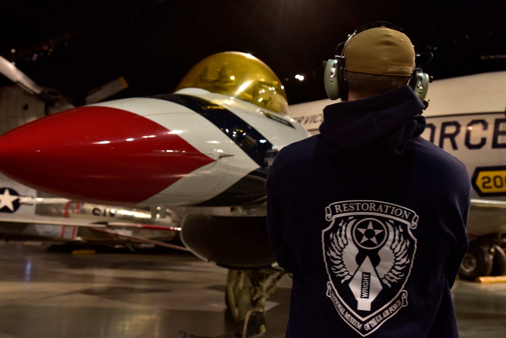 DAYTON, Ohio -- General Dynamics F-16A Fighting Falcon in the Cold War Gallery at the National Museum of the United States Air Force. A restoration crew member worked as part of a team to complete the gallery reconfiguration on Jan. 26, 2017. (U.S. Air Force photo)
