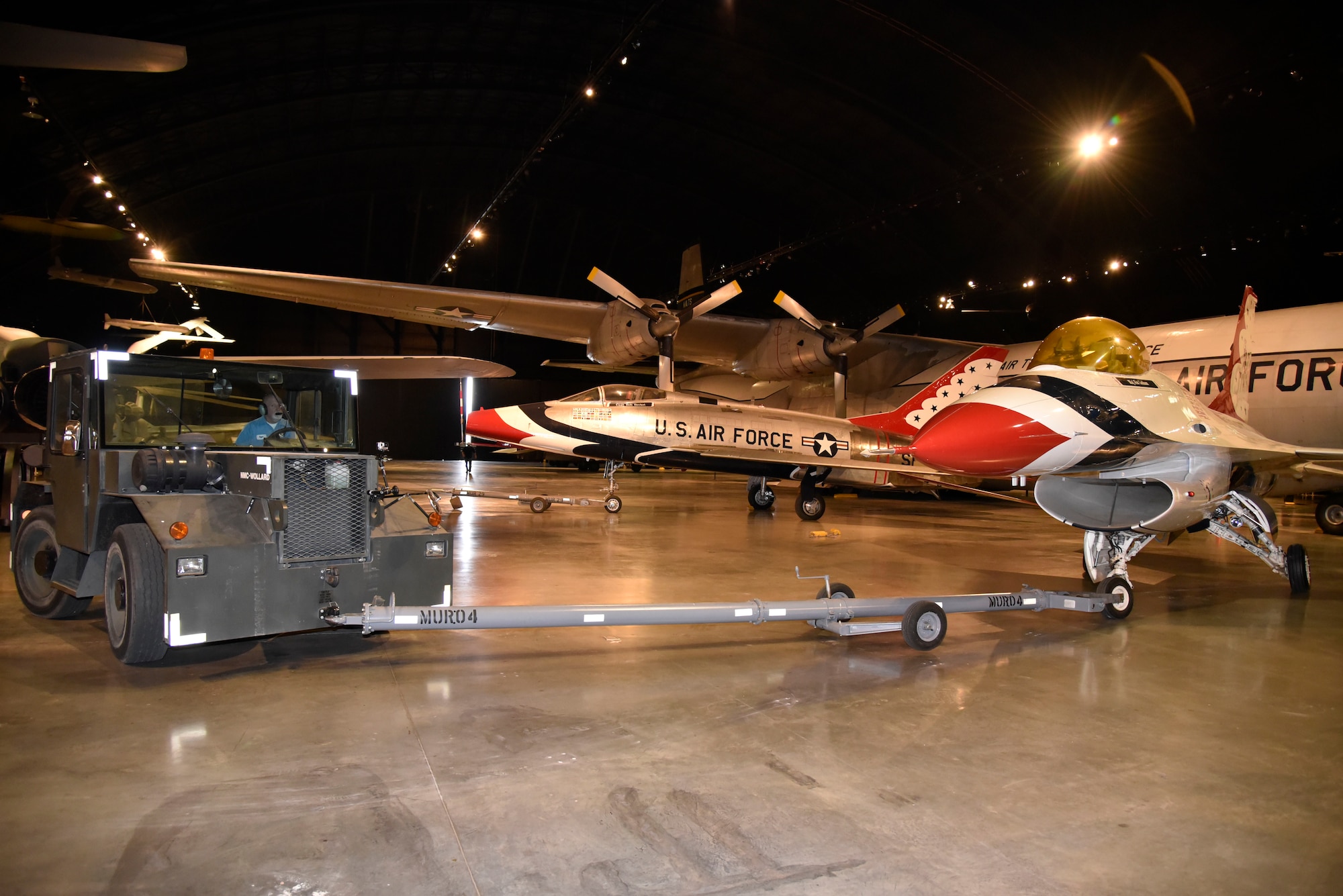 DAYTON, Ohio -- General Dynamics F-16A Fighting Falcon being moved into position in the Cold War Gallery at the National Museum of the United States Air Force. This restoration crew member worked as part of a team to complete the gallery reconfiguration on Jan. 26, 2017. (U.S. Air Force photo)