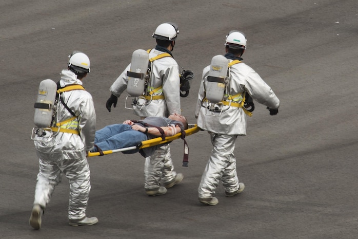 U.S. Marines, Sailors and Japanese Maritime Self-Defense Force personnel conducted a mass casualty exercise on Marine Corps Air Station Iwakuni, Japan, March 1, 2017. The exercise assessed the air station’s initial response, incident management, activation of emergency operations center and mass casualty plan in the event of a downed aircraft. (U.S. Marine Corps photo by Lance Cpl. Joseph Abrego)