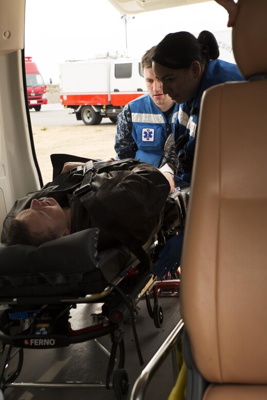 U.S. Marines, Sailors and Japanese Maritime Self-Defense Force personnel conducted a mass casualty exercise on Marine Corps Air Station Iwakuni, Japan, March 1, 2017. The exercise assessed the air station’s initial response, incident management, activation of emergency operations center and mass casualty plan in the event of a downed aircraft. (U.S. Marine Corps photo by Lance Cpl. Joseph Abrego)