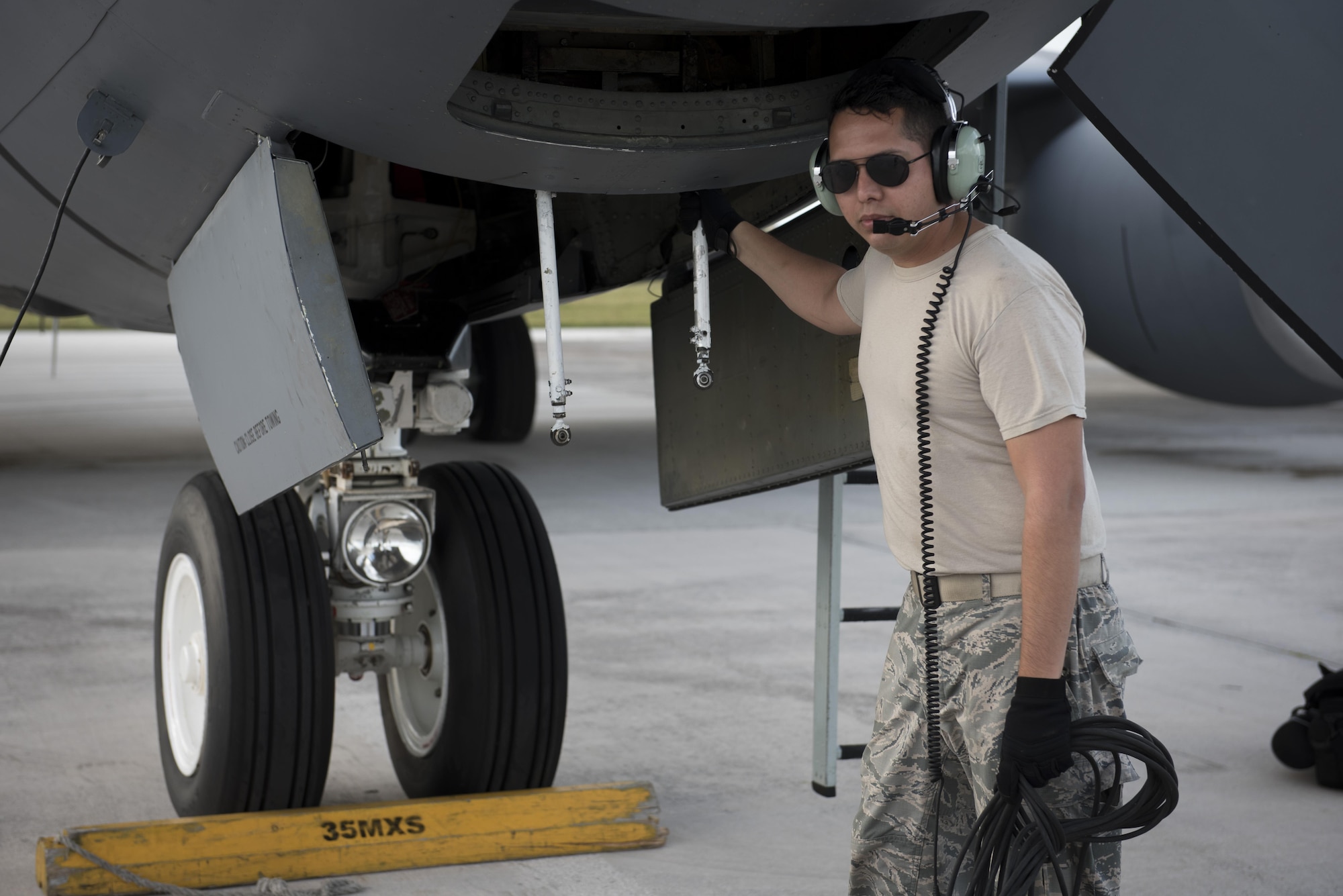 U.S. Air Force Airman 1st Class Joshua Tuckett, 18th Operations Support Squadron weather technician, is on Andersen Air Force Base, Guam, to participate in annual Exercise Cope North. Tuckett is responsible for providing essential weather information to aircrew and mission planers before every flight. Members of Kadena Air Base, Japan, are among 2,700 U.S. Airmen, Sailors and Marines who are training alongside approximately 600 combined JASDF and Royal Australian Air Force service members. (U.S. Air Force photo by Senior Airman John Linzmeier)