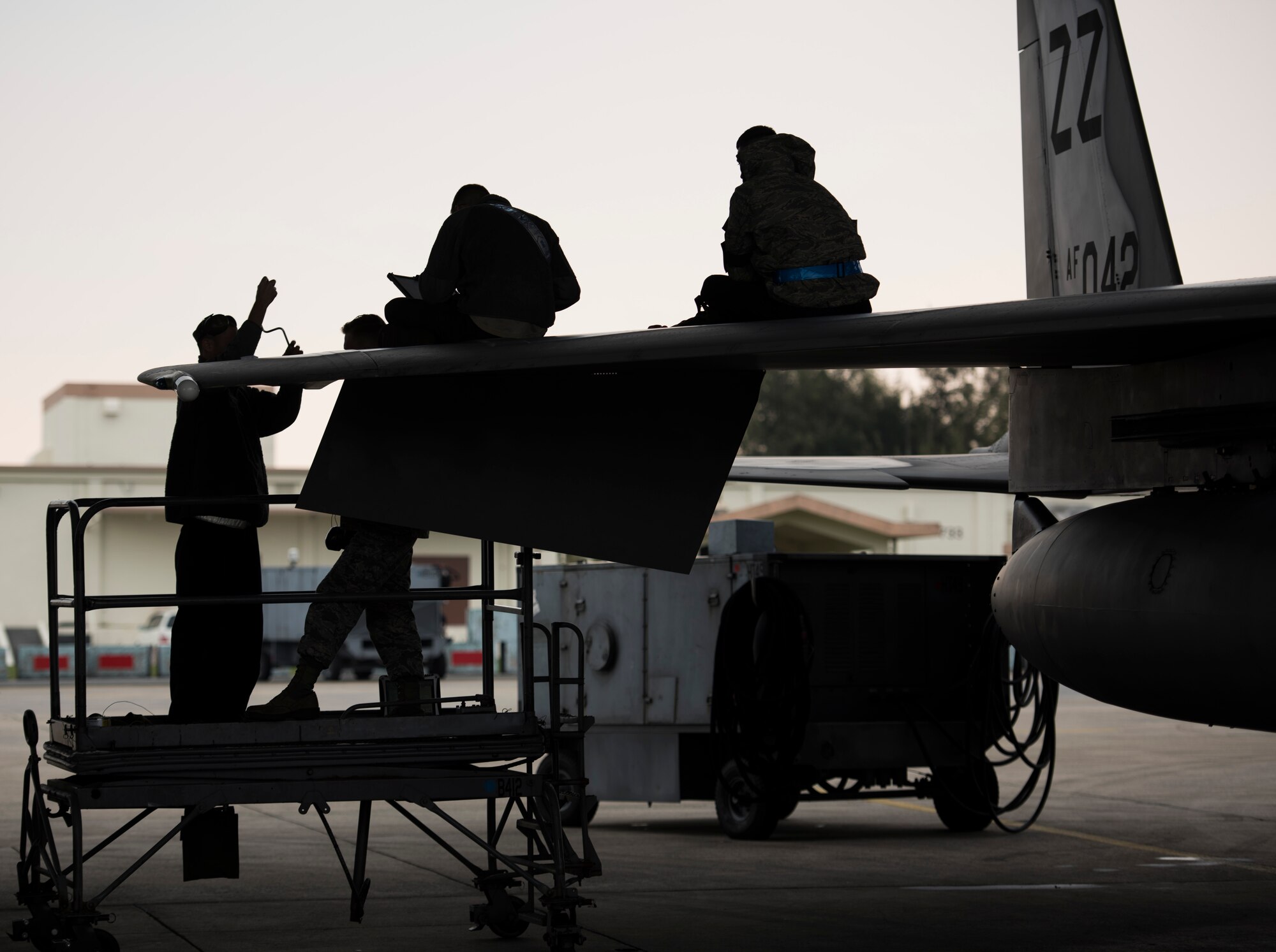 Airmen from the 18th Maintenance Squadron maintain an F-15C Eagle Mar. 2, 2017, at Kadena Air Base, Japan. Maintenance Airmen require precise attention to detail since proper maintenance can mean the difference between mission success and failure. (U.S. Air Force photo by Senior Airman Omari Bernard/Released)