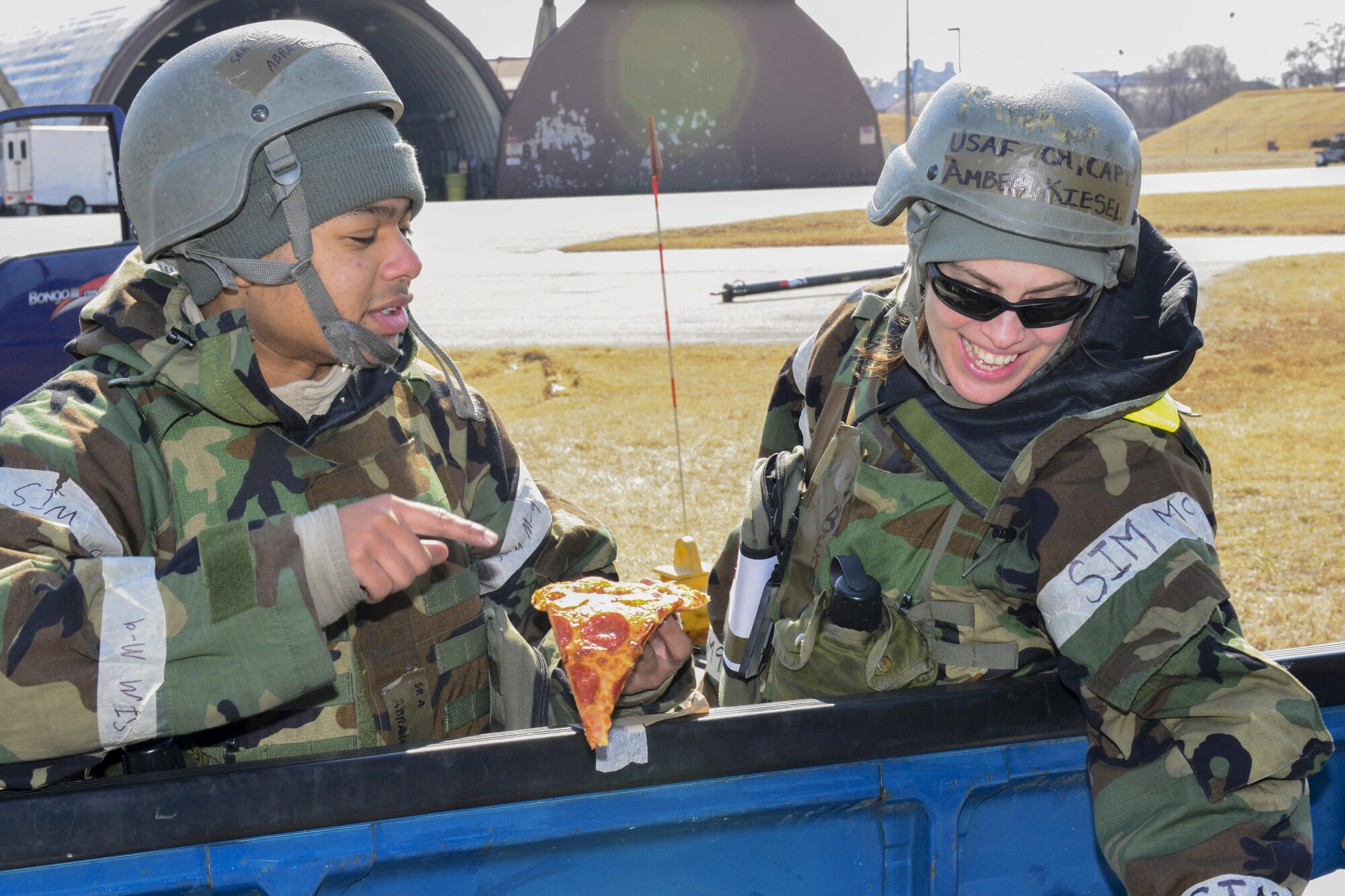 U.S. Air Force Senior Airman Kyron Abraham, thanks U.S. Air Force Chap. (Capt.) Amber Kiesel, 51st Fighter Wing chaplain, for the food and drink she brought out to the flightline during Exercise Beverly Herd 17-1 at Osan Air Base, Republic of Korea, March 2, 2017. Kiesel and other members of the 51st FW chapel staff went across the base with offers of food and drink to help keep morale up during the exercise. (U.S. Air Force photo by Staff Sgt. Victor J. Caputo)