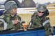U.S. Air Force Senior Airman Kyron Abraham, thanks U.S. Air Force Chap. (Capt.) Amber Kiesel, 51st Fighter Wing chaplain, for the food and drink she brought out to the flightline during Exercise Beverly Herd 17-1 at Osan Air Base, Republic of Korea, March 2, 2017. Kiesel and other members of the 51st FW chapel staff went across the base with offers of food and drink to help keep morale up during the exercise. (U.S. Air Force photo by Staff Sgt. Victor J. Caputo)