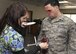 Jamie Gujski, 51st Medical Group education and training simulation operator, prepares a role player as a simulated unexploded ordnance victim during Exercise Beverly Herd 17-1 at Osan Air Base, Republic of Korea, March 2, 2017. The scenario was based off of a real-world situation that happened in the Middle East, painting a realistic picture of war that highlighted the importance of being prepared and ready to “Fight Tonight.” (U.S. Air Force photo by Airman Gwendalyn Smith)