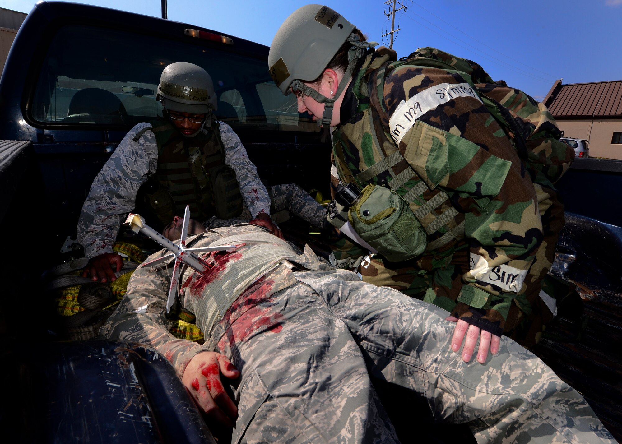 Role players take part in a simulated unexploded ordnance victim scenario during Exercise Beverly Herd 17-1 at Osan Air Base, Republic of Korea, March 2, 2017. During this scenario the  surgeon was required to remove the UXO and safely hand it over to the 51st Civil Engineer Squadron explosive ordnance disposal team for further disposal. (U.S. Air Force photo by Airman Gwendalyn Smith)