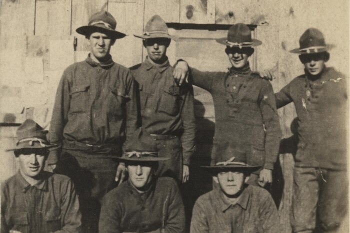 Doughboys of Company G, 137th Infantry Regiment, 35th Division pose in front of a barracks in France in 1918. The soldier in the front row – Pvt. John Frary – was killed in the Meuse-Argonne campaign. Photo courtesy of the National World War I Museum and Memorial