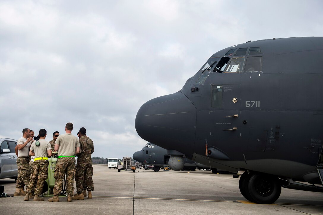 Airmen receive a mission briefing before participating in Emerald Warrior 17 at Hurlburt Field, Fla., Feb. 28, 2017. The airmen are assigned to the 9th Special Operations Squadron. Emerald Warrior is a U.S. Special Operations Command exercise in which joint special operations forces train to respond to threats across the spectrum of conflict. Air Force photo by Staff Sgt. Corey Hook